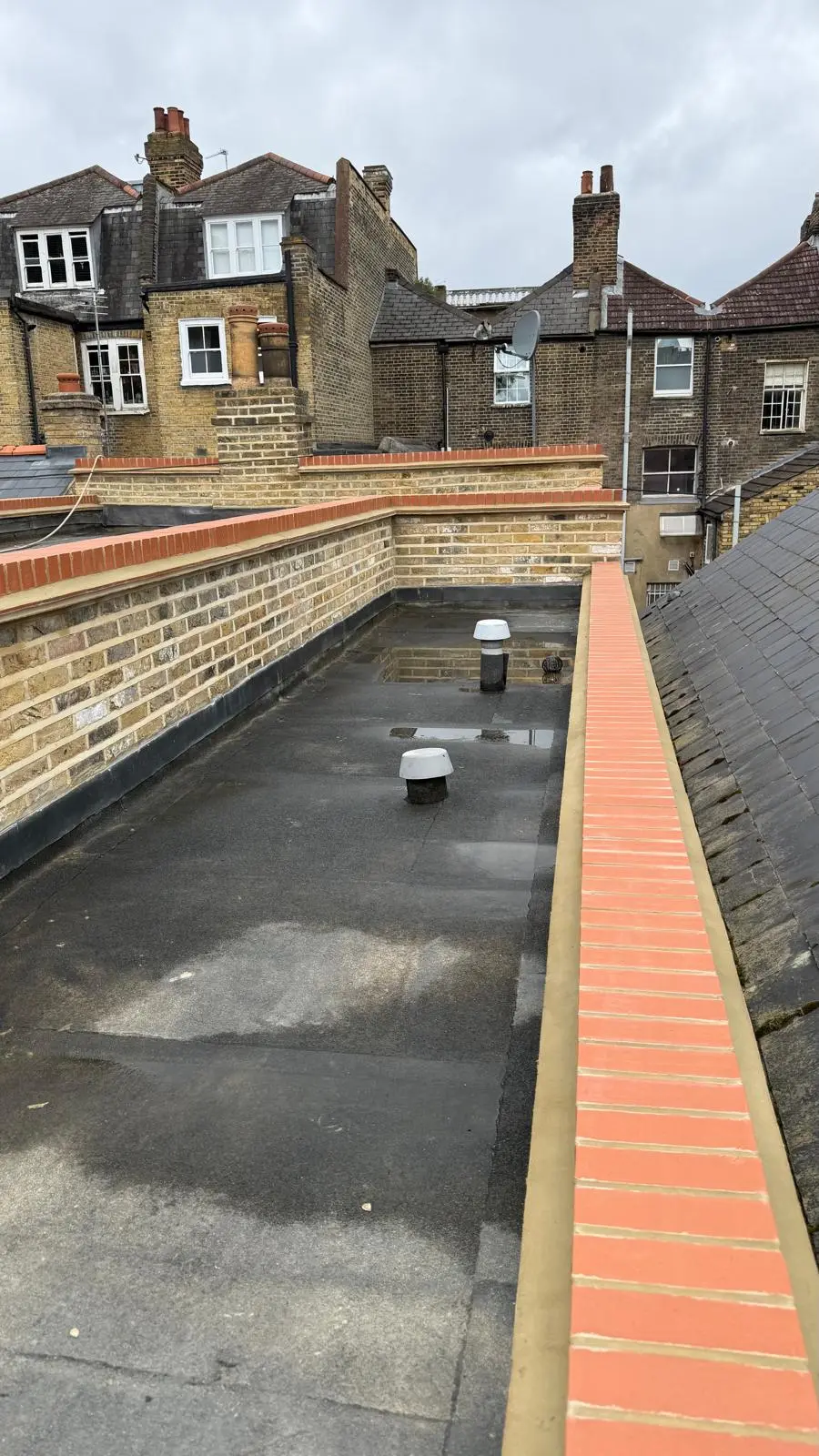 New brickwork — brick on edge parapet wall, Deptford
