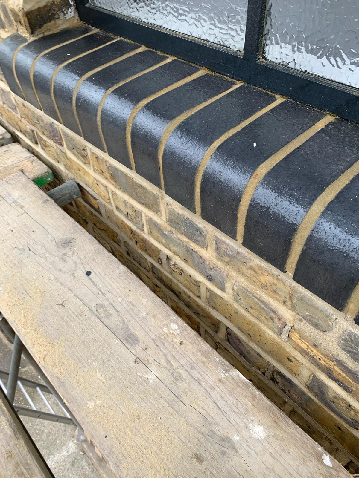 Victorian terrace brickwork after lime mortar repointing — clean finished joints, Tottenham North London