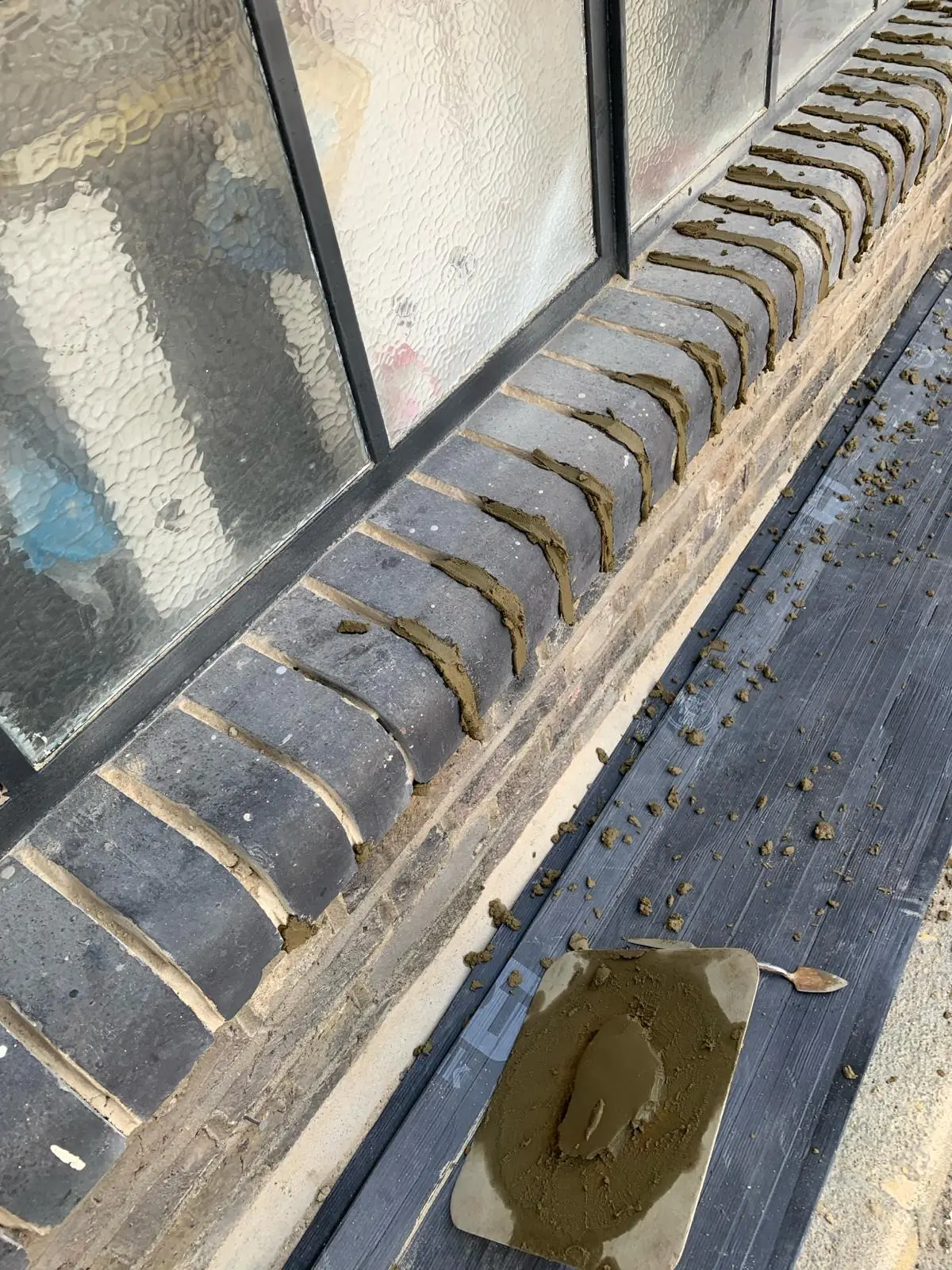 Victorian terrace brickwork before lime mortar repointing — eroded mortar joints, Tottenham North London