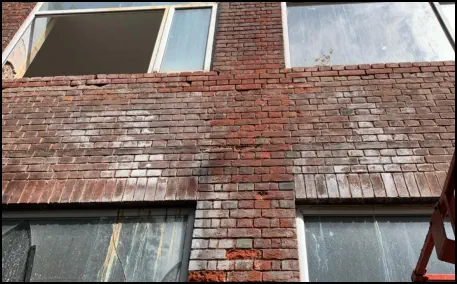 Cement, paint and damaged brickwork - Stoke Newington - N16