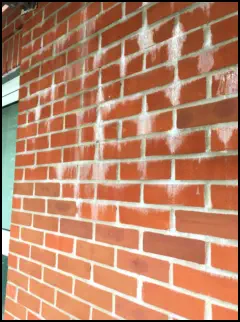 Stained dirty brickwork in Islington
