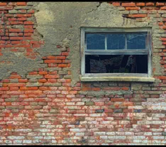 Render removal and brickwork restoration in Surrey
