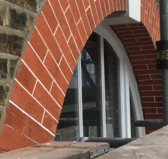Tuck pointing to red brickwork - London